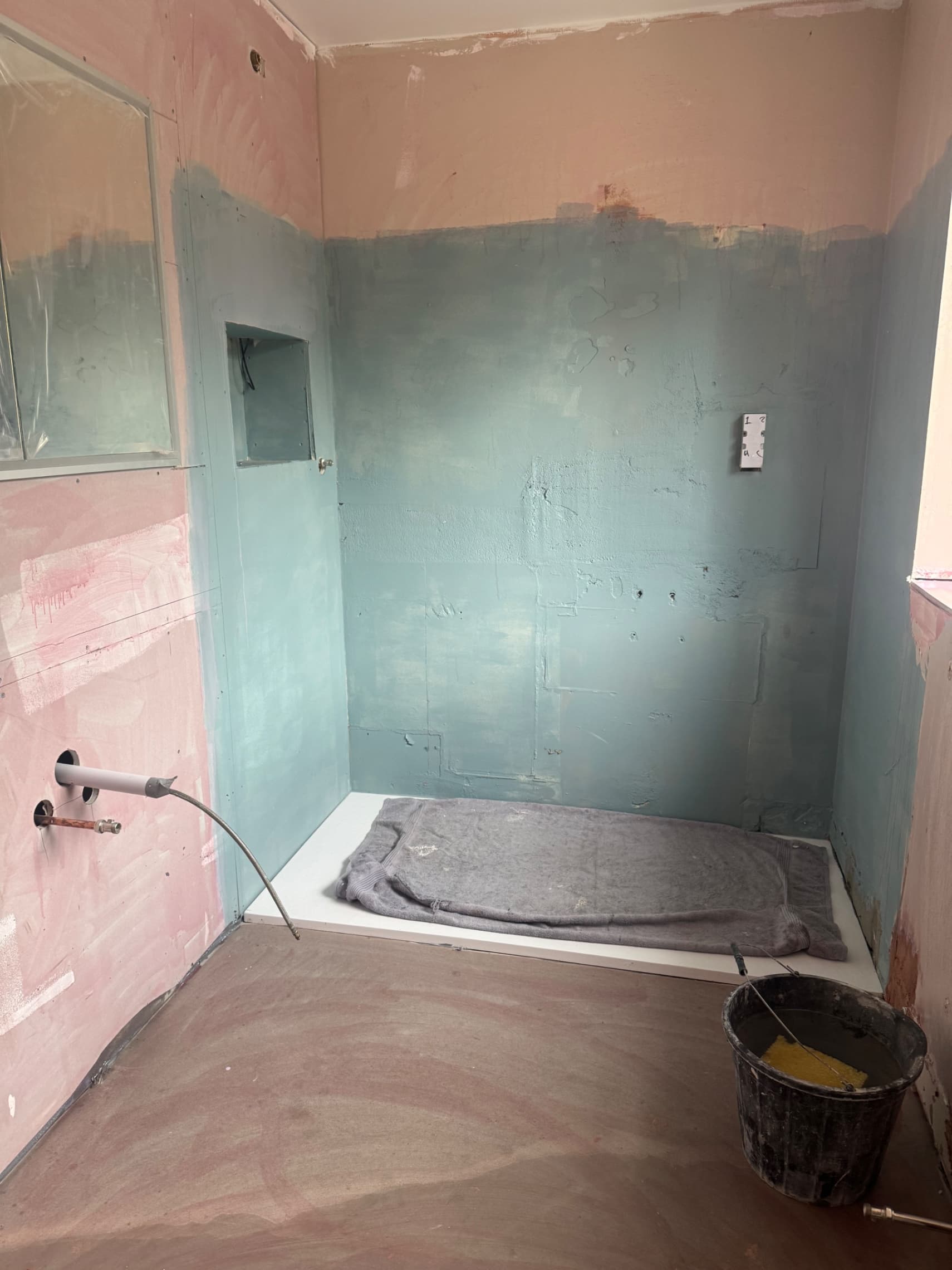 We're all set to start tiling this full bathroom in Crowthorne for Springtide Bathrooms, with the surfaces prepared and ready to go.