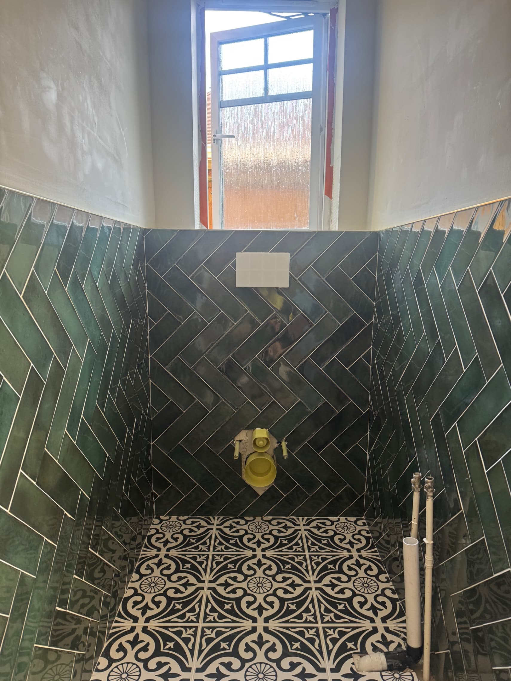 Herringbone feature wall in a Wokingham downstairs toilet