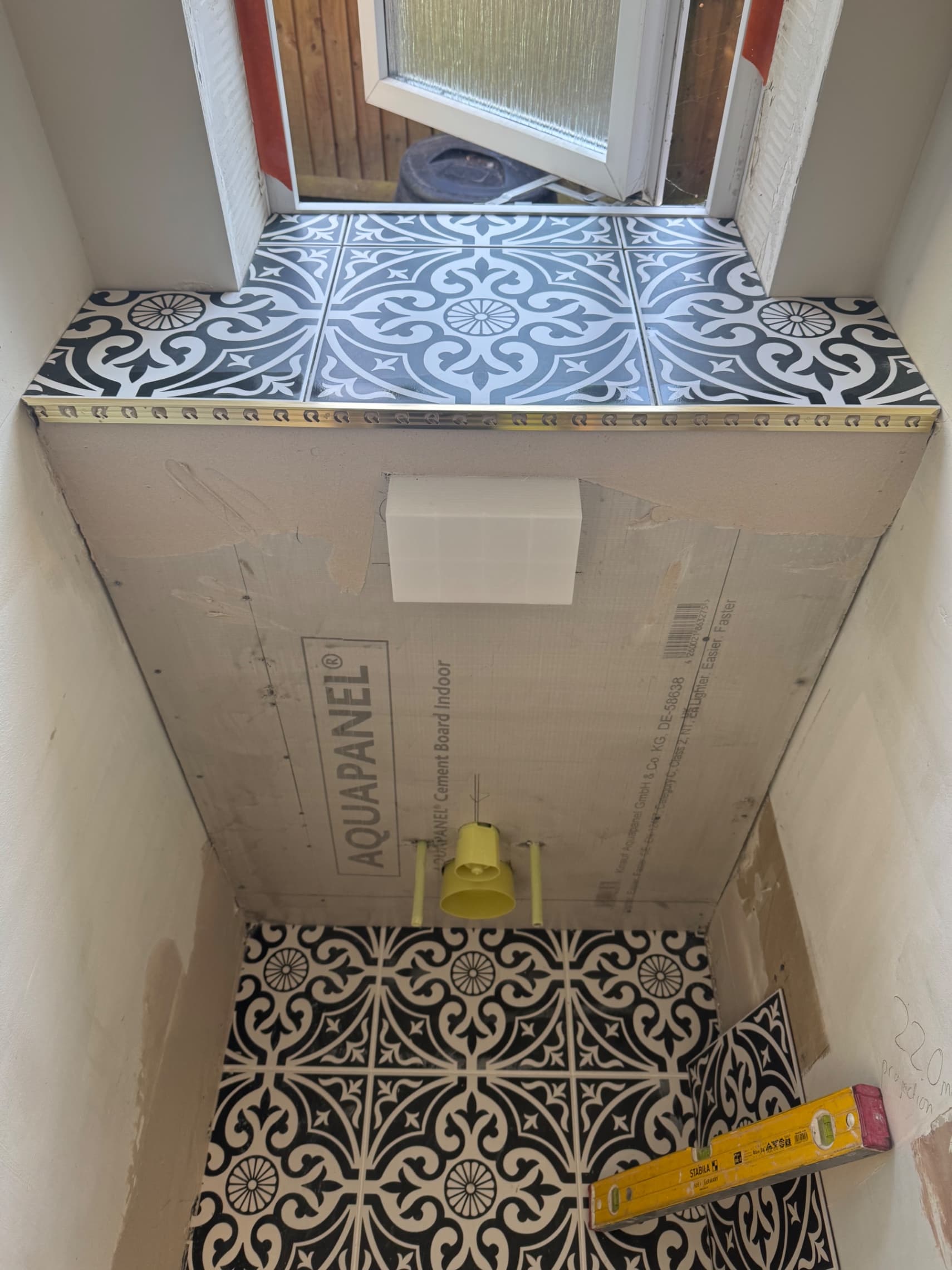Herringbone feature wall in a Wokingham downstairs toilet