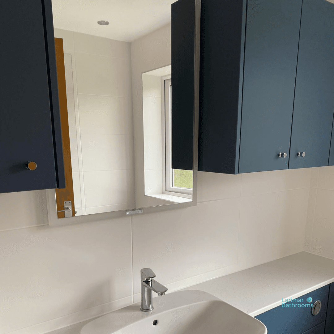 New cabinets and sanitaryware installed.